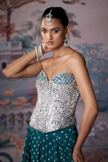 Shop Amrta By Guneet Kondal Silver Chinon Mirrors Sweetheart Neck Work Corset And Lehenga Set Online at Aza Fashions Shop_Amrta By Guneet Kondal_Silver Chinon Mirrors Sweetheart Neck Work Corset And Lehenga Set _Online_at_Aza_Fashions