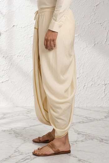 Bubber Couture Off White Silk, Cotton Rivaan Draped Dhoti Pant Online at Aza Fashions Bubber Couture_Off White Silk, Cotton Rivaan Draped Dhoti Pant _Online_at_Aza_Fashions