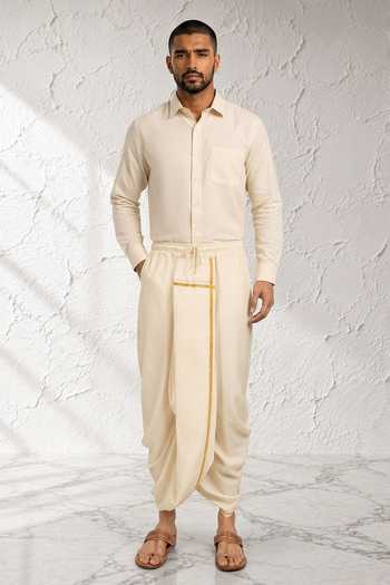 Buy Bubber Couture Off White Silk, Cotton Rivaan Draped Dhoti Pant Online at Aza Fashions Buy_Bubber Couture_Off White Silk, Cotton Rivaan Draped Dhoti Pant _Online_at_Aza_Fashions