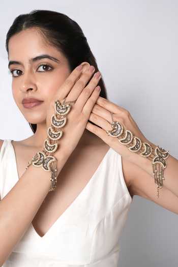 Shop Vaidaan Gold Plated Aarna Mirror Statement Haathphool - Single Pc at Aza Fashions Shop_Vaidaan_Gold Plated Aarna Mirror Statement Haathphool - Single Pc _at_Aza_Fashions