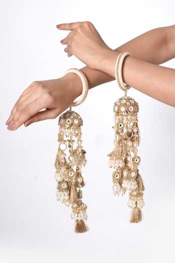 Vaidaan Gold Plated Drishti Pearl Tassel Pair Of Kaleeras Online at Aza Fashions Vaidaan_Gold Plated Drishti Pearl Tassel Pair Of Kaleeras _Online_at_Aza_Fashions