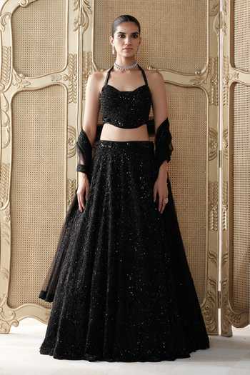 Shop Basanti Kapde Aur Koffee Black Net Halter Neck Noir Etoile Embroidered Lehenga Set Online at Aza Fashions Shop_Basanti Kapde Aur Koffee_Black Net Halter Neck Noir Etoile Embroidered Lehenga Set _Online_at_Aza_Fashions