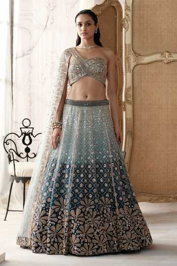 Basanti Kapde Aur Koffee Blue Net Asymmetric Neck Aqua Lagoon Embroidered Lehenga And Blouse Set at Aza Fashions Basanti Kapde Aur Koffee_Blue Net Asymmetric Neck Aqua Lagoon Embroidered Lehenga And Blouse Set _at_Aza_Fashions