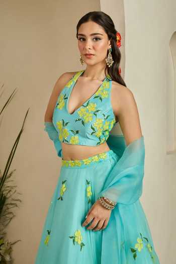 Buy Meghstudio Blue Crepe, Organza Halter Neck Bloom Sequin Embroidered Lehenga Set Online at Aza Fashions Buy_Meghstudio_Blue Crepe, Organza Halter Neck Bloom Sequin Embroidered Lehenga Set _Online_at_Aza_Fashions
