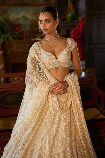 Shop_Seema Gujral_Ivory Net Sweetheart Neck Crystal Embroidered Lehenga Set _Online_at_Aza_Fashions