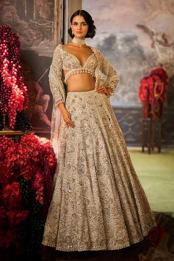 Seema Gujral Ivory Net Sweetheart Neck Sequin Embroidered Lehenga Set Online at Aza Fashions Seema Gujral_Ivory Net Sweetheart Neck Sequin Embroidered Lehenga Set _Online_at_Aza_Fashions