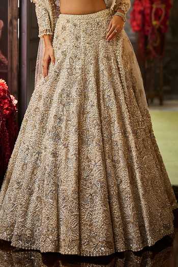 Seema Gujral Ivory Net Sweetheart Neck Sequin Embroidered Lehenga Set at Aza Fashions Seema Gujral_Ivory Net Sweetheart Neck Sequin Embroidered Lehenga Set _at_Aza_Fashions
