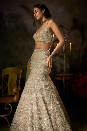Buy Seema Gujral Gold Net Plunge Neck Geometric Embroidered Lehenga Set Online at Aza Fashions Buy_Seema Gujral_Gold Net Plunge Neck Geometric Embroidered Lehenga Set _Online_at_Aza_Fashions
