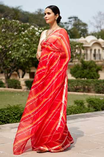 Geroo Jaipur_Red Silk Round Neck Leheriya Saree With Embroidered Blouse _Online_at_Aza_Fashions