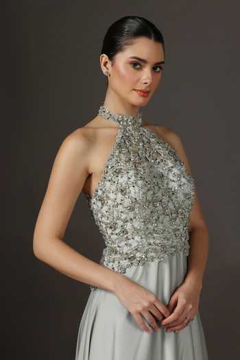 Shop Pooja Peshoria Silver Satin Crystals, Sequins, Beads, Tassels Halter Neck Hand Embroidery Gown Online at Aza Fashions Shop_Pooja Peshoria_Silver Satin Crystals, Sequins, Beads, Tassels Halter Neck Hand Embroidery Gown _Online_at_Aza_Fashions