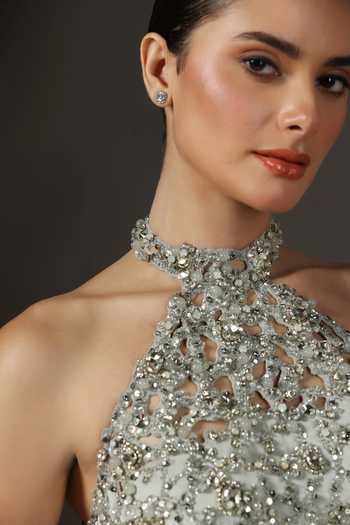 Pooja Peshoria Silver Satin Crystals, Sequins, Beads, Tassels Halter Neck Hand Embroidery Gown at Aza Fashions Pooja Peshoria_Silver Satin Crystals, Sequins, Beads, Tassels Halter Neck Hand Embroidery Gown _at_Aza_Fashions