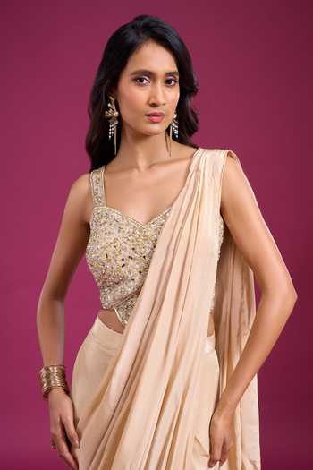 Aariyana Couture_Beige Viscose Georgette Sweetheart Neck Pre-draped Saree With Bead Work Blouse _Online_at_Aza_Fashions