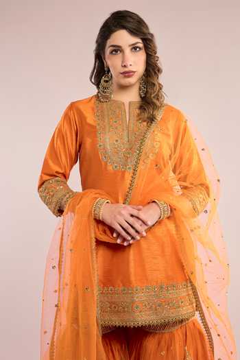 Shop Saina Kapoor Orange Dupion, Net Keyhole Neck, Yes Yoke Embroidered Kurta Gharara Set Online at Aza Fashions Shop_Saina Kapoor_Orange Dupion, Net Keyhole Neck, Yes Yoke Embroidered Kurta Gharara Set _Online_at_Aza_Fashions