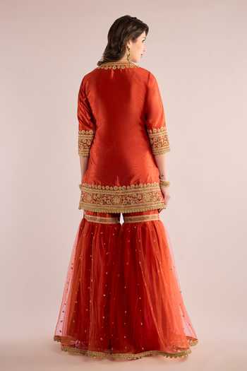 Shop Saina Kapoor Orange Dupion, Net Keyhole Neck Yoke Embellished Kurta Gharara Set at Aza Fashions Shop_Saina Kapoor_Orange Dupion, Net Keyhole Neck Yoke Embellished Kurta Gharara Set _at_Aza_Fashions