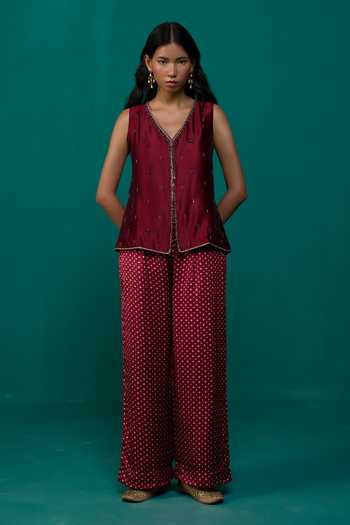Neitri Maroon Silk, Muslin V-neck Parijat Waistcoat And Bandhani Pant Set at Aza Fashions Neitri_Maroon Silk, Muslin V-neck Parijat Waistcoat And Bandhani Pant Set _at_Aza_Fashions