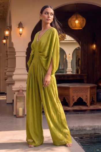 Buy House Of Fett Green Chiffon V-neck Festive Flared Jumpsuit Online at Aza Fashions Buy_House Of Fett_Green Chiffon V-neck Festive Flared Jumpsuit _Online_at_Aza_Fashions
