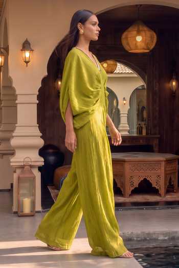 Shop House Of Fett Green Chiffon V-neck Festive Flared Jumpsuit Online at Aza Fashions Shop_House Of Fett_Green Chiffon V-neck Festive Flared Jumpsuit _Online_at_Aza_Fashions