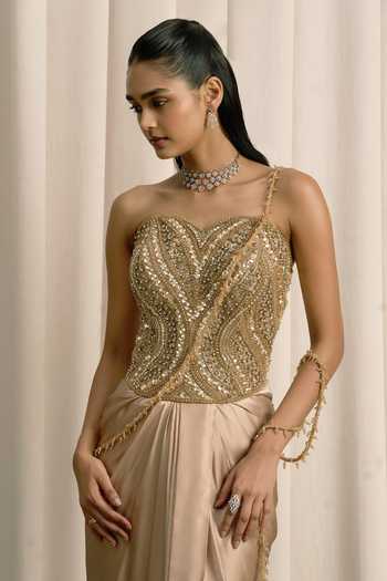 Buy Istya Beige Organza, Satin Sequins, Beads, Stones Embellished Corset And Skirt Set Online at Aza Fashions Buy_Istya_Beige Organza, Satin Sequins, Beads, Stones Embellished Corset And Skirt Set _Online_at_Aza_Fashions