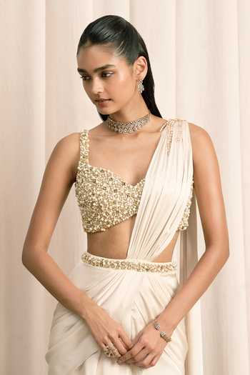 Buy Istya Ivory Organza, Satin Sweetheart Neck Pre-draped Saree With Embellished Blouse Online at Aza Fashions Buy_Istya_Ivory Organza, Satin Sweetheart Neck Pre-draped Saree With Embellished Blouse _Online_at_Aza_Fashions