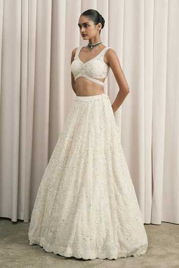 Buy_Istya_Ivory Net V-neck Geometric Embroidered Lehenga Set _Online_at_Aza_Fashions