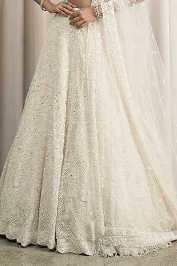 Shop_Istya_Ivory Net V-neck Geometric Embroidered Lehenga Set _Online_at_Aza_Fashions