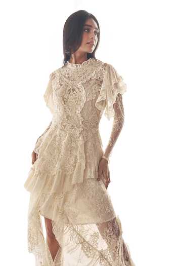 Dash And Dot Ivory Polyester High Neck Cascading Lace Midi Dress at Aza Fashions Dash And Dot_Ivory Polyester High Neck Cascading Lace Midi Dress _at_Aza_Fashions
