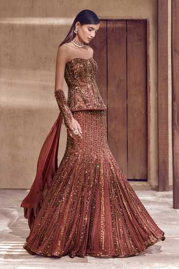 Shop Nidhika Shekhar Brown Crepe, Shantoon Sequins, Beads Kansya Noor Embroidered Corset Lehenga Set Online at Aza Fashions Shop_Nidhika Shekhar_Brown Crepe, Shantoon Sequins, Beads Kansya Noor Embroidered Corset Lehenga Set _Online_at_Aza_Fashions