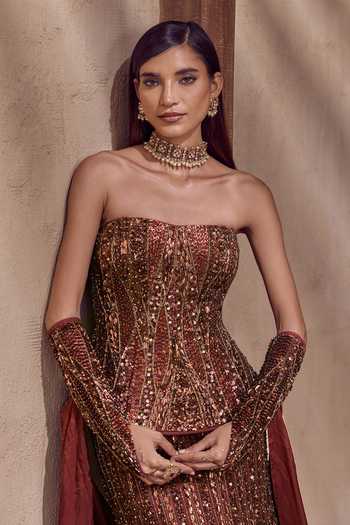 Nidhika Shekhar Brown Crepe, Shantoon Sequins, Beads Kansya Noor Embroidered Corset Lehenga Set at Aza Fashions Nidhika Shekhar_Brown Crepe, Shantoon Sequins, Beads Kansya Noor Embroidered Corset Lehenga Set _at_Aza_Fashions