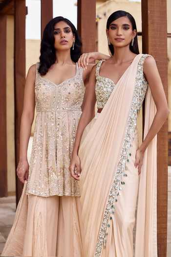 Shop Nidhika Shekhar Pink Georgette Sweetheart Neck, Mrinalini Embroidered Flared Kurta Sharara Set Online at Aza Fashions Shop_Nidhika Shekhar_Pink Georgette Sweetheart Neck, Mrinalini Embroidered Flared Kurta Sharara Set _Online_at_Aza_Fashions
