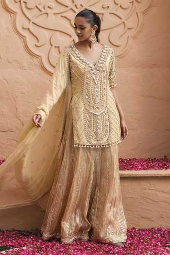 Shop Nidhika Shekhar Gold Tissue, Shantoon V-neck, Yes Kanchan Meher Embroidered Kurta Sharara Set Online at Aza Fashions Shop_Nidhika Shekhar_Gold Tissue, Shantoon V-neck, Yes Kanchan Meher Embroidered Kurta Sharara Set _Online_at_Aza_Fashions
