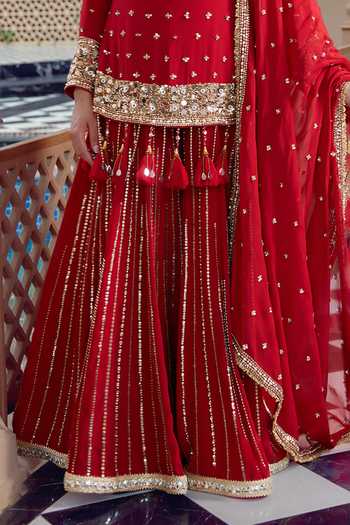 Shop Nidhika Shekhar Red Crepe Leaf Neck, Yes Padma Valli Embroidered Sharara Set Online at Aza Fashions Shop_Nidhika Shekhar_Red Crepe Leaf Neck, Yes Padma Valli Embroidered Sharara Set _Online_at_Aza_Fashions