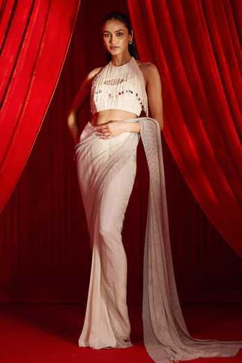 Shop NIDHIKA SHEKHAR Ivory Crepe Halter Neck Jhilmil Anvaya Pre-draped Saree With Blouse Online at Aza Fashions Shop_NIDHIKA SHEKHAR_Ivory Crepe Halter Neck Jhilmil Anvaya Pre-draped Saree With Blouse _Online_at_Aza_Fashions