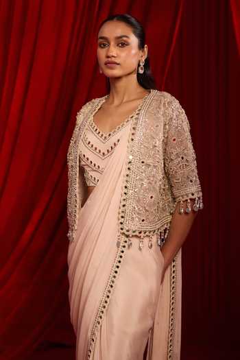 NIDHIKA SHEKHAR Pink Organza, Net, Chiffon Meeras Embroidered Cape With Pre-draped Saree Set at Aza Fashions NIDHIKA SHEKHAR_Pink Organza, Net, Chiffon Meeras Embroidered Cape With Pre-draped Saree Set _at_Aza_Fashions