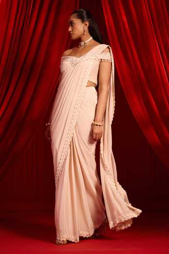Buy NIDHIKA SHEKHAR Pink Crepe Off-shoulder Sanyoga Gulabi Border Embellished Pre-draped Saree Set Online at Aza Fashions Buy_NIDHIKA SHEKHAR_Pink Crepe Off-shoulder Sanyoga Gulabi Border Embellished Pre-draped Saree Set _Online_at_Aza_Fashions