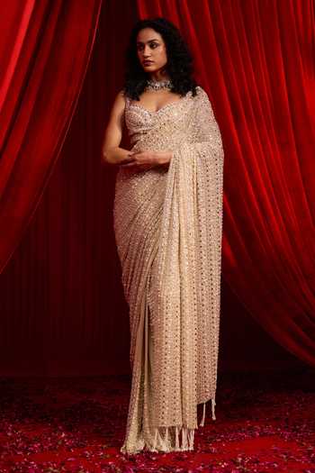 Buy NIDHIKA SHEKHAR Gold Georgette Sweetheart Anvaya Nakshi Embroidered Pre-draped Saree With Blouse Online at Aza Fashions Buy_NIDHIKA SHEKHAR_Gold Georgette Sweetheart Anvaya Nakshi Embroidered Pre-draped Saree With Blouse _Online_at_Aza_Fashions