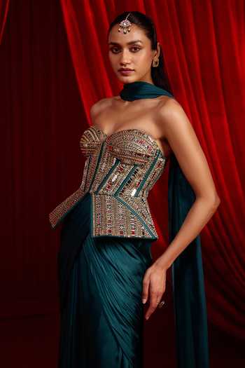 NIDHIKA SHEKHAR Blue Satin, Modal Beads, Haritah Sanyoga Embellished Corset Draped Skirt Set at Aza Fashions NIDHIKA SHEKHAR_Blue Satin, Modal Beads, Haritah Sanyoga Embellished Corset Draped Skirt Set _at_Aza_Fashions