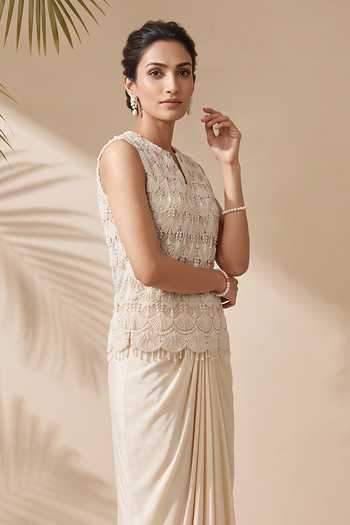 Aneesh Agarwaal Ivory Net, Satin Split V-neck Wisteria Embroidered Top And Dhoti Skirt Set Online at Aza Fashions Aneesh Agarwaal_Ivory Net, Satin Split V-neck Wisteria Embroidered Top And Dhoti Skirt Set _Online_at_Aza_Fashions
