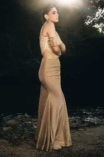 Buy Aaryaa By Kashveen Kohli Gold Net High Neck Amber Pleated Shimmer Skirt And Blouse Set Online at Aza Fashions Buy_Aaryaa By Kashveen Kohli_Gold Net High Neck Amber Pleated Shimmer Skirt And Blouse Set _Online_at_Aza_Fashions