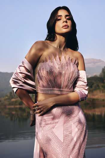 Shop Aaryaa By Kashveen Kohli Pink Net, Satin Bandeau Neck Roselle Mermaid Skirt Set With Bow Cape Shop_Aaryaa By Kashveen Kohli_Pink Net, Satin Bandeau Neck Roselle Mermaid Skirt Set With Bow Cape