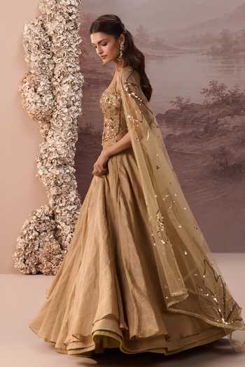 Shop Parul Gandhi Gold Tissue Sequins, Beads, Stones Tabeer Embellished Corset Lehenga Set Online at Aza Fashions Shop_Parul Gandhi_Gold Tissue Sequins, Beads, Stones Tabeer Embellished Corset Lehenga Set _Online_at_Aza_Fashions