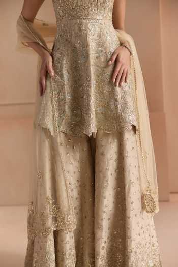 Shop Osaa By Adarsh Beige Silk, Tissue V-neck Embroidered Peplum Top Gharara Set Online at Aza Fashions Shop_Osaa By Adarsh_Beige Silk, Tissue V-neck Embroidered Peplum Top Gharara Set _Online_at_Aza_Fashions