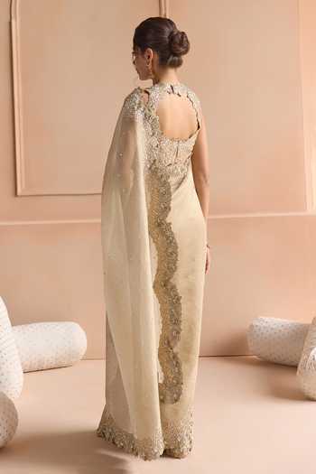 Shop Osaa By Adarsh Beige Tissue High Neck Scallop Border Embroidered Saree And Blouse Set at Aza Fashions Shop_Osaa By Adarsh_Beige Tissue High Neck Scallop Border Embroidered Saree And Blouse Set _at_Aza_Fashions