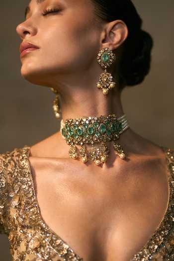 Shop Angad Singh Gold Net Sweetheart Neck Solstice Embroidered Bridal Lehenga Set Online at Aza Fashions Shop_Angad Singh_Gold Net Sweetheart Neck Solstice Embroidered Bridal Lehenga Set _Online_at_Aza_Fashions