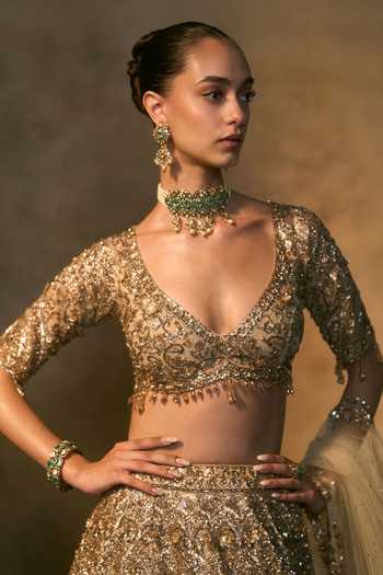 Angad Singh Gold Net Sweetheart Neck Solstice Embroidered Bridal Lehenga Set at Aza Fashions Angad Singh_Gold Net Sweetheart Neck Solstice Embroidered Bridal Lehenga Set _at_Aza_Fashions