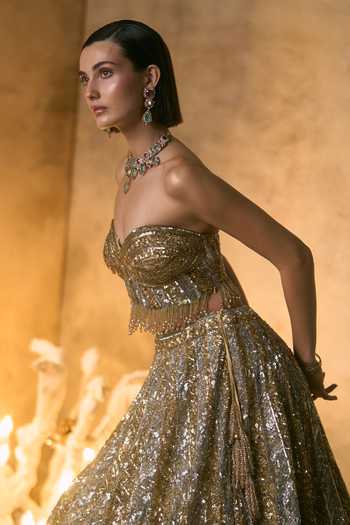 Shop Angad Singh Gold Net Sequins, Beads, Zari, Crystals, Aurelia Embroidered Corset Lehenga Set Online at Aza Fashions Shop_Angad Singh_Gold Net Sequins, Beads, Zari, Crystals, Aurelia Embroidered Corset Lehenga Set _Online_at_Aza_Fashions