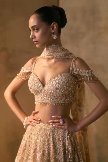 Shop Angad Singh Peach Net Sweetheart Neck Azura Bead Embroidered Lehenga Set Online at Aza Fashions Shop_Angad Singh_Peach Net Sweetheart Neck Azura Bead Embroidered Lehenga Set _Online_at_Aza_Fashions