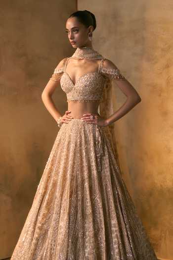 Angad Singh Peach Net Sweetheart Neck Azura Bead Embroidered Lehenga Set at Aza Fashions Angad Singh_Peach Net Sweetheart Neck Azura Bead Embroidered Lehenga Set _at_Aza_Fashions