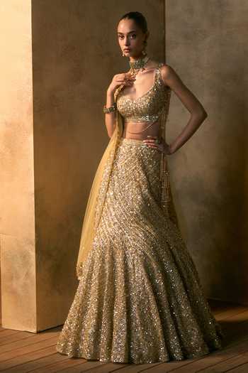 Angad Singh Gold Net Scoop Neck Soleil Tonal Sequin Embroidered Fishcut Lehenga Set at Aza Fashions Angad Singh_Gold Net Scoop Neck Soleil Tonal Sequin Embroidered Fishcut Lehenga Set _at_Aza_Fashions