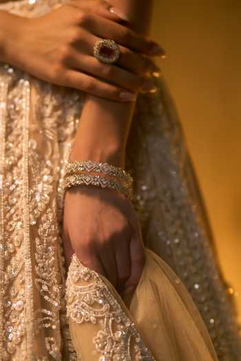 Shop Angad Singh Gold Net V-neck Vermeil Tonal Crystal Embroidered Lehenga Set Online at Aza Fashions Shop_Angad Singh_Gold Net V-neck Vermeil Tonal Crystal Embroidered Lehenga Set _Online_at_Aza_Fashions