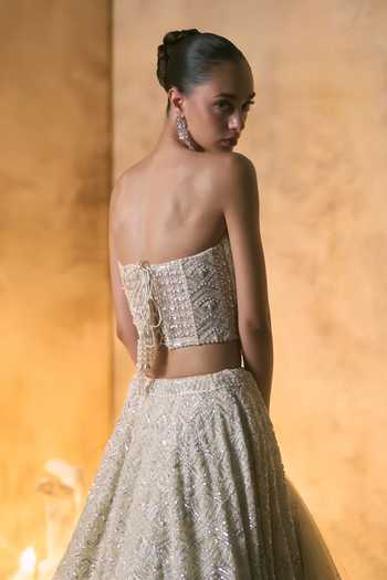 Shop Angad Singh Ivory Net Embroidery, Sequins, Beads, Pearls Bandeau Lumina Corset Lehenga Set Online at Aza Fashions Shop_Angad Singh_Ivory Net Embroidery, Sequins, Beads, Pearls Bandeau Lumina Corset Lehenga Set _Online_at_Aza_Fashions